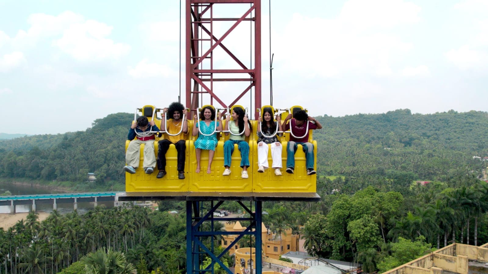 Group on drop tower ride at Flora Fantasia Kerala