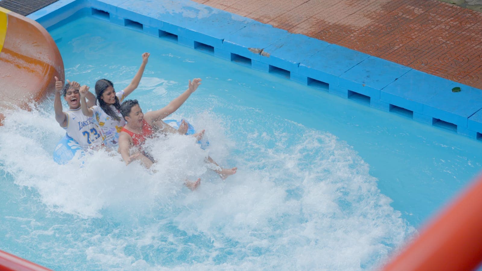Family on raft water ride at Flora Fantasia amusement park